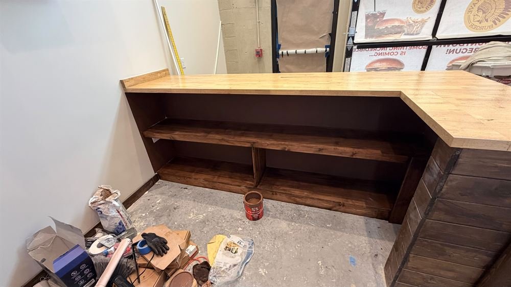 Custom built wood counter and shelving unit
